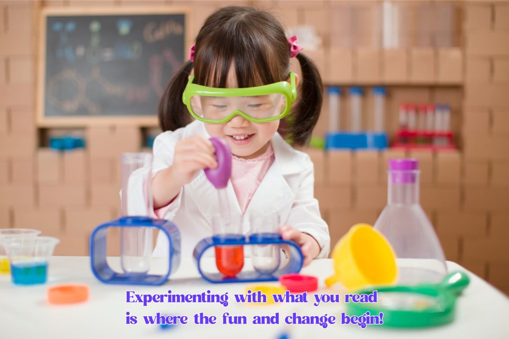 a little girl is experimenting with beakers and colored liquid in a toy lab and wearing a lab coat and goggles and the text on the image reads "experimenting with what you read is where the fun and change begin!"