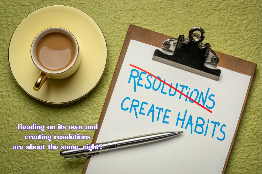A cup of coffee sits next to a clipboard with "resolutions" crossed out and "create habits" written underneath, with a pen on top of the paper. Text overlay reads "reading on its own and creating resolutions are about the same, right?"