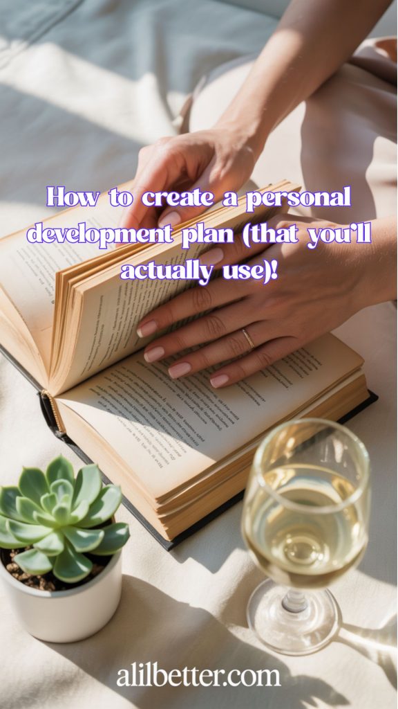 hands are holding a book open with a succulent and glass of wine and text that reads "How to create a personal development plan (that you'll actually use)!"