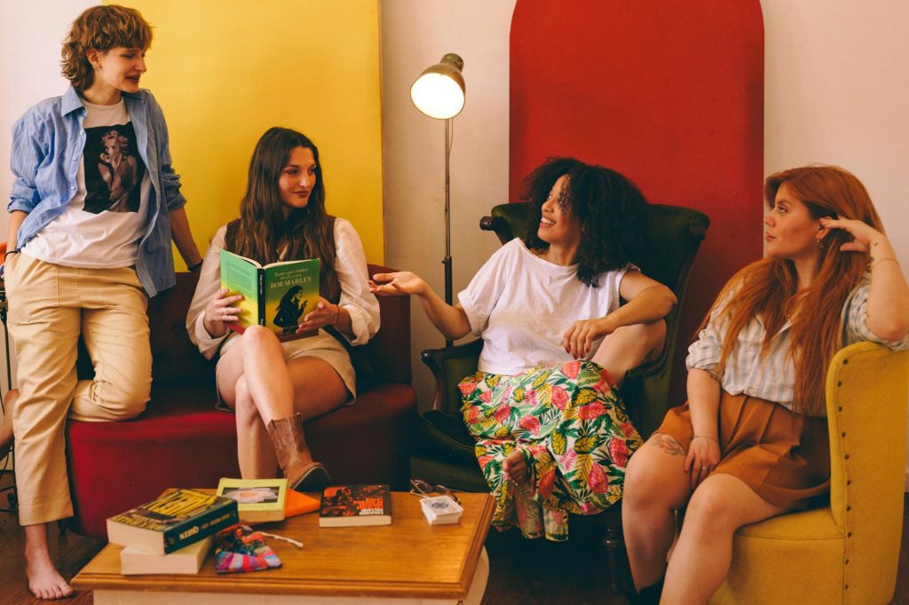 group of friends chatting about books 